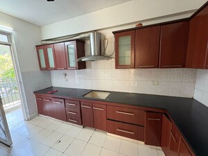 Kitchen in 3.5 BHK Apartment at Orchid Petals, Sector 49 – for Sale