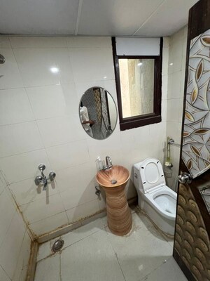 Bathroom in 3 BHK Apartment at Kbnows Apartment, Sector 16 Greater Noida – for Rent