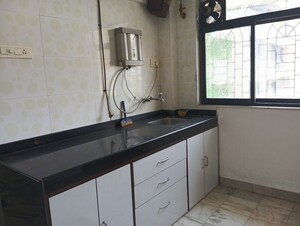 Kitchen in 1 BHK Apartment at Sahayog Complex, Manpada – for Rent