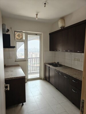 Kitchen in 4 BHK Apartment at DLF New Town Heights III, Sector 91 – for Rent