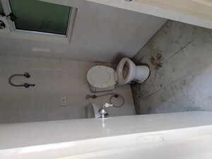 Bathroom in 2 BHK Apartment at MCC Signature Heights, Raj Nagar Extension – for Rent