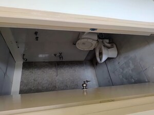 Bathroom in 2 BHK Apartment at MCC Signature Heights, Raj Nagar Extension – for Rent