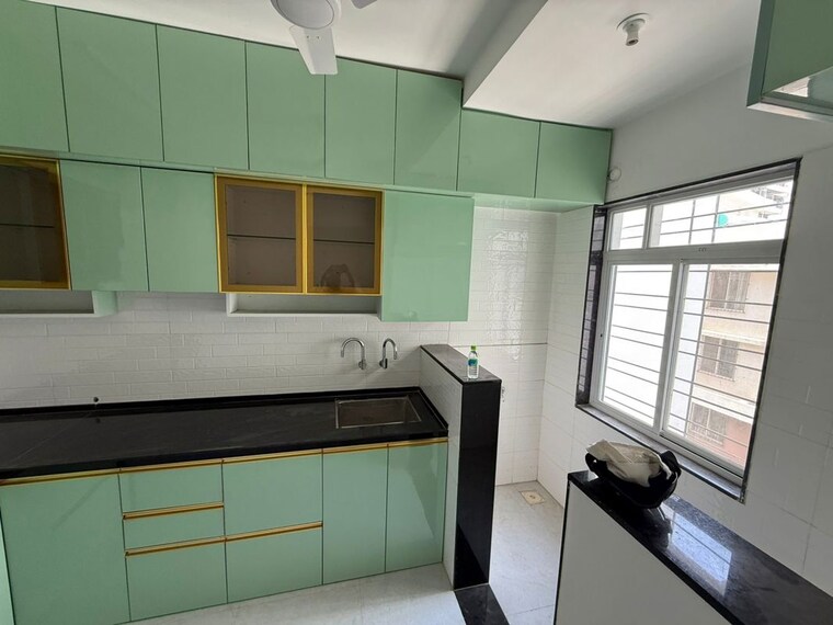 Kitchen, surya-skies 3 Bedroom 1060 Sq.Ft. Apartment In Punawale Pune 10431242