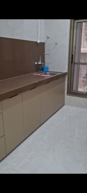 Kitchen in 2 BHK Apartment at Atharva CHS Vile Parle , Vile Parle East – for Rent