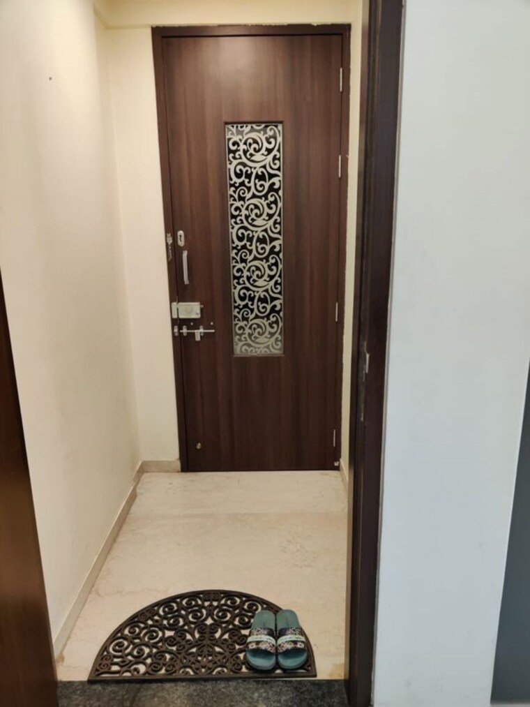 Living Room, gera-song-of-joy 2 Bedroom 950 Sq.Ft. Apartment In Kharadi Pune 10431276