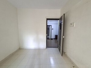 Living Room in 1 RK Apartment at DV Fressia Ill, Dahisar West – for Sale