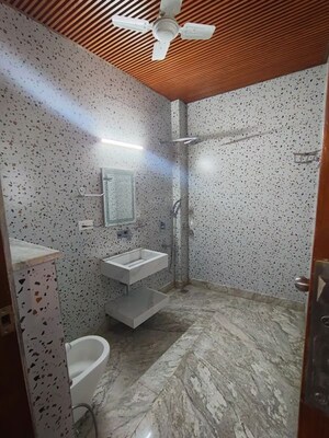 Bathroom in 4 BHK Builder Floor at Sukhdev Vihar – for Rent