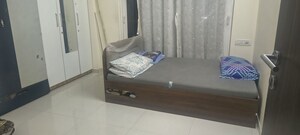Bedroom in 2 BHK Apartment at Brahmand CHS, Brahmand – for Rent