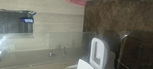 Bathroom in 2 BHK Apartment at Brahmand CHS, Brahmand – for Rent