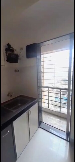 Kitchen in 2 BHK Apartment at DB Parkwoods, Kasarvadavali – for Sale