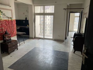 Living Room in 2 BHK Apartment at Proview Technocity, Chi V Greater Noida – for Sale