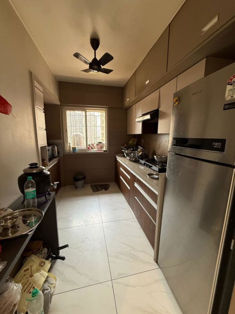 Kitchen, runwal-garden-city 3 Bedroom 816 Sq.Ft. Apartment In Balkum Pada Thane 10431923