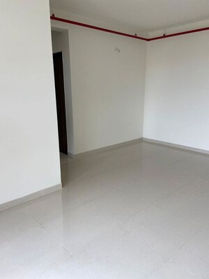 Living Room in 1 BHK Apartment at JP North Alexa, Mira Road – for Rent