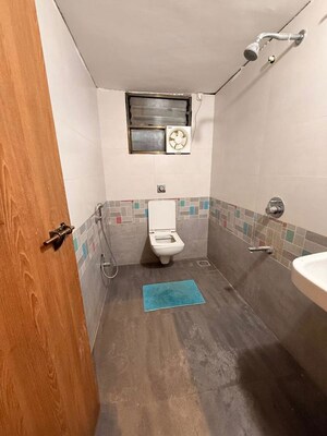 Bathroom in Studio Apartment at Mhada Colony – for Rent