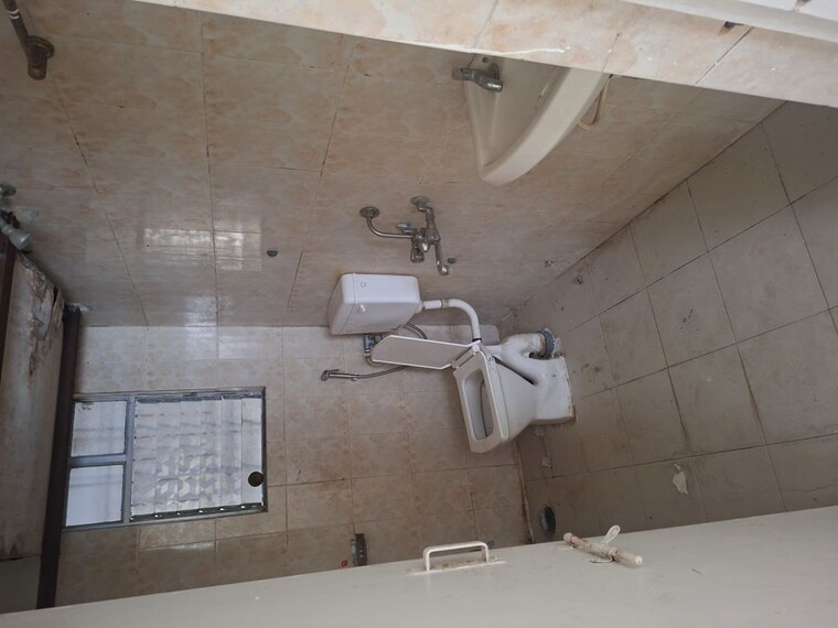 Bathroom, supreme-aangan-society 1 Bedroom 635 Sq.Ft. Apartment In Wagholi Pune 10432464