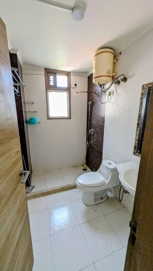 Bathroom in 2 BHK Apartment at Woodland Apartment, Andheri West – for Rent