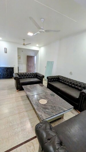 Living Room in 2 BHK Apartment at Woodland Apartment, Andheri West – for Rent