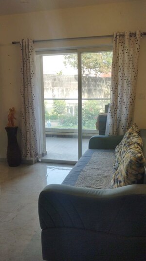 Living Room in 2 BHK Apartment at Rama Melange Residences, Hinjewadi – for Rent