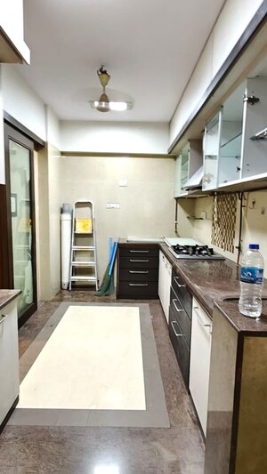 Kitchen in 3 BHK Apartment at DB Realty Shagun Towers, Goregaon East – for Rent