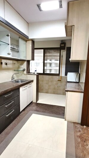 Kitchen in 3 BHK Apartment at DB Realty Shagun Towers, Goregaon East – for Rent