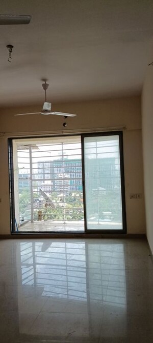 Living Room in 2 BHK Apartment at Bharat Niwash, Andheri West – for Rent