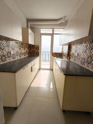Kitchen in 2 BHK Apartment at Hawelia Valencia Homes, Sector 1 Greater Noida – for Rent