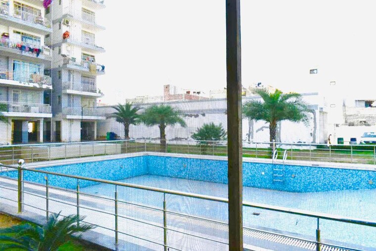 Swimming Pool, zara-aavaas 2.5 Bedroom 750 Sq.Ft. Apartment In Sector 104 Gurgaon 10433161