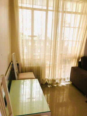 Living Room in 2.5 BHK Apartment at Zara Aavaas, Sector 104 – for Rent