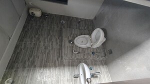 Bathroom in 1.5 BHK Apartment at Lodha Lakeshore Greens, Dombivli East – for Rent