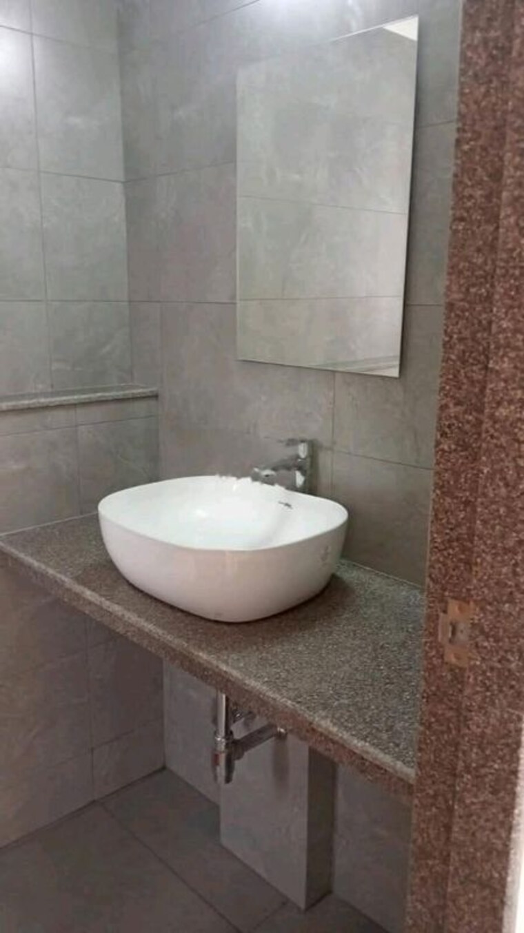 Bathroom, godrej-nest-kandivali 1 Bedroom 556 Sq.Ft. Apartment In Kandivali East Mumbai 10433353