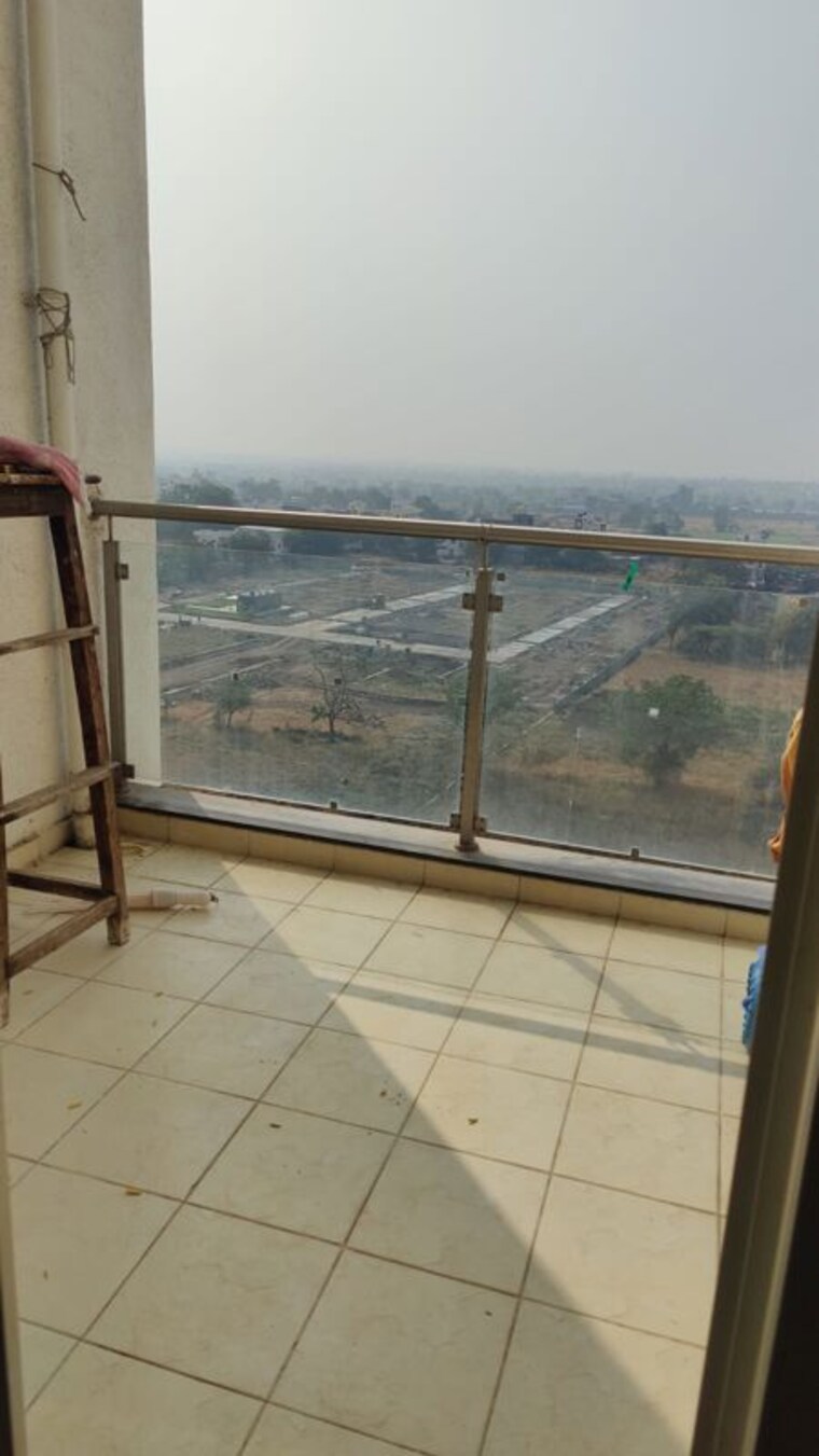 Balcony, gagan-micasaa 2 Bedroom 750 Sq.Ft. Apartment In Wagholi Pune 10433379