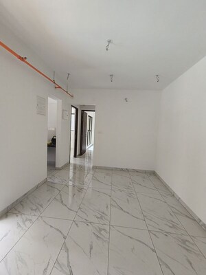 Building Lobby in 2 BHK Apartment at Raymond Ten X Habitat, Pokhran Road No Two – for Rent