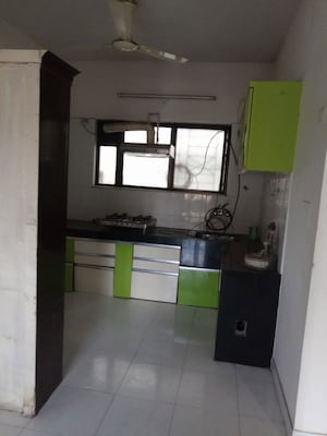 Kitchen in 2 BHK Apartment at Popular Colony Apartment, Warje – for Sale
