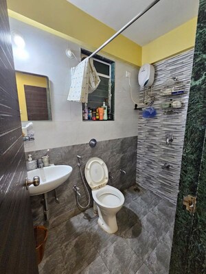 Bathroom in 2 BHK Apartment at DSS Mahavir Kalpavruksha Alcacia Tower, Ghodbunder Road – for Rent