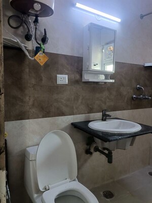 Bathroom in 3 BHK Apartment at Aims Golf Avenue I, Sector 75 – for Rent