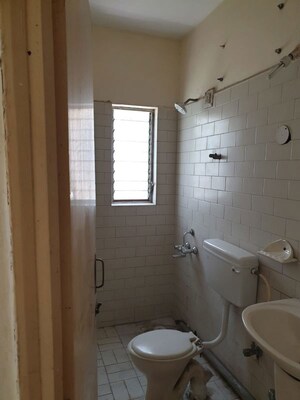 Bathroom in 2 BHK Apartment at Arunali Society, Paud Road – for Rent