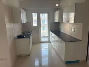 Kitchen in 2.5 BHK Apartment at Samridhi Luxuriya Avenue, Sector 150 – for Sale