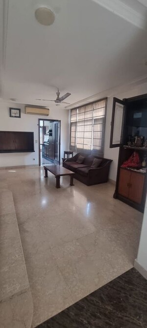 Living Room in 4 BHK Apartment at Greater Kailash – for Rent