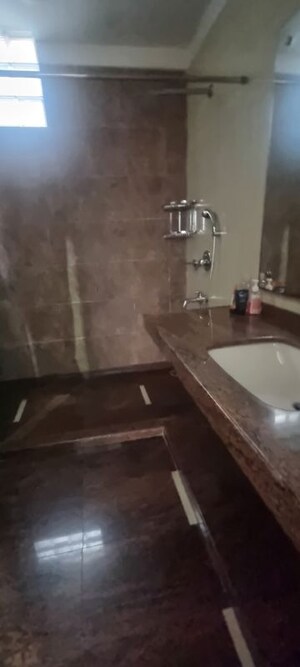 Bathroom in 4 BHK Apartment at Greater Kailash – for Rent