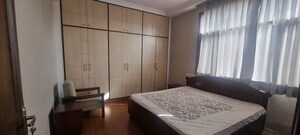 Bedroom in 4 BHK Apartment at Greater Kailash – for Rent