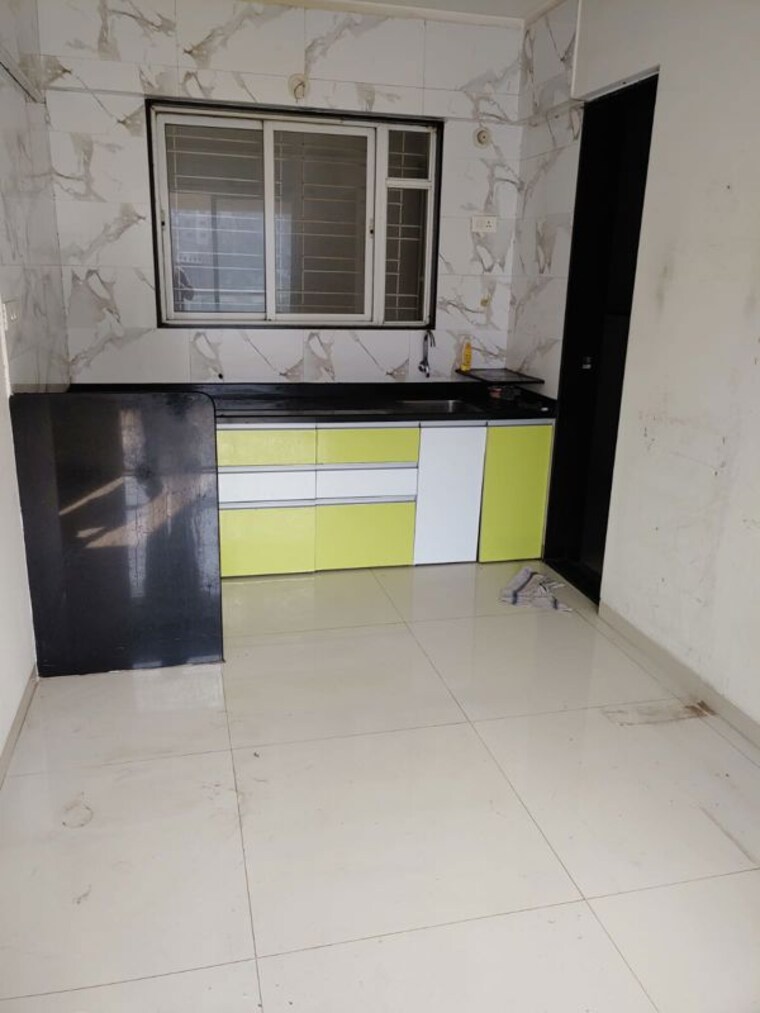 Kitchen, unicons-nirmitee-echinus-court 2 Bedroom 1000 Sq.Ft. Apartment In Balewadi Pune 10433895