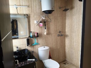 Bathroom in 3 BHK Apartment at Samridhi Luxuriya Avenue, Sector 150 – for Sale