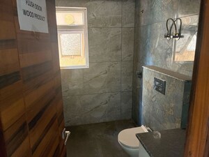 Bathroom in 4 BHK Apartment at Samridhi Luxuriya Avenue, Sector 150 – for Sale