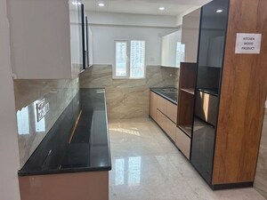 Kitchen in 4 BHK Apartment at Samridhi Luxuriya Avenue, Sector 150 – for Sale