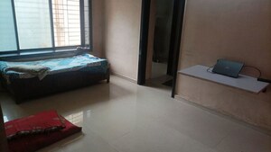 Living Room in 1 BHK Apartment at Khadakpada – for Sale