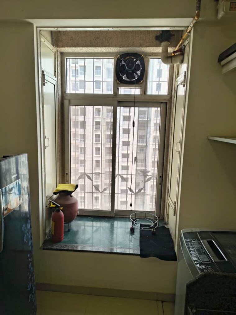 Kitchen, puranik-rumah-bali 2 Bedroom 700 Sq.Ft. Apartment In Ghodbunder Road Thane 10434236