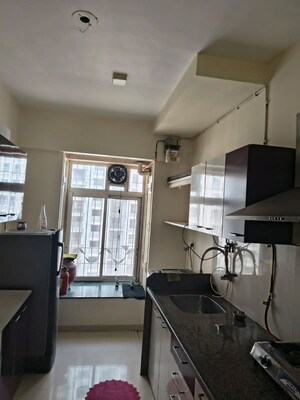 Kitchen in 2 BHK Apartment at Puranik Rumah Bali, Ghodbunder Road – for Rent