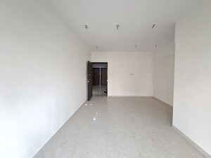 Living Room in 2 BHK Apartment at Boa Vista CHS, Borivali West – for Sale