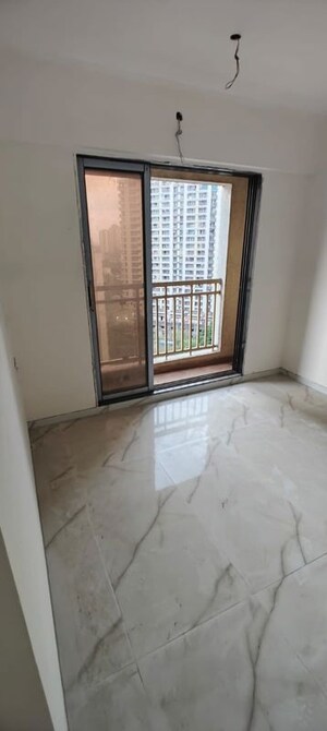 Room in 2 BHK Apartment at Paradigm Zenith Pushpanjali Residency Phase III, Ghodbunder Road – for Sale