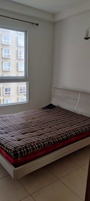 Bedroom in 1.5 BHK Apartment at Bhartiya Nikoo Homes, Thanisandra Main Road – for Rent